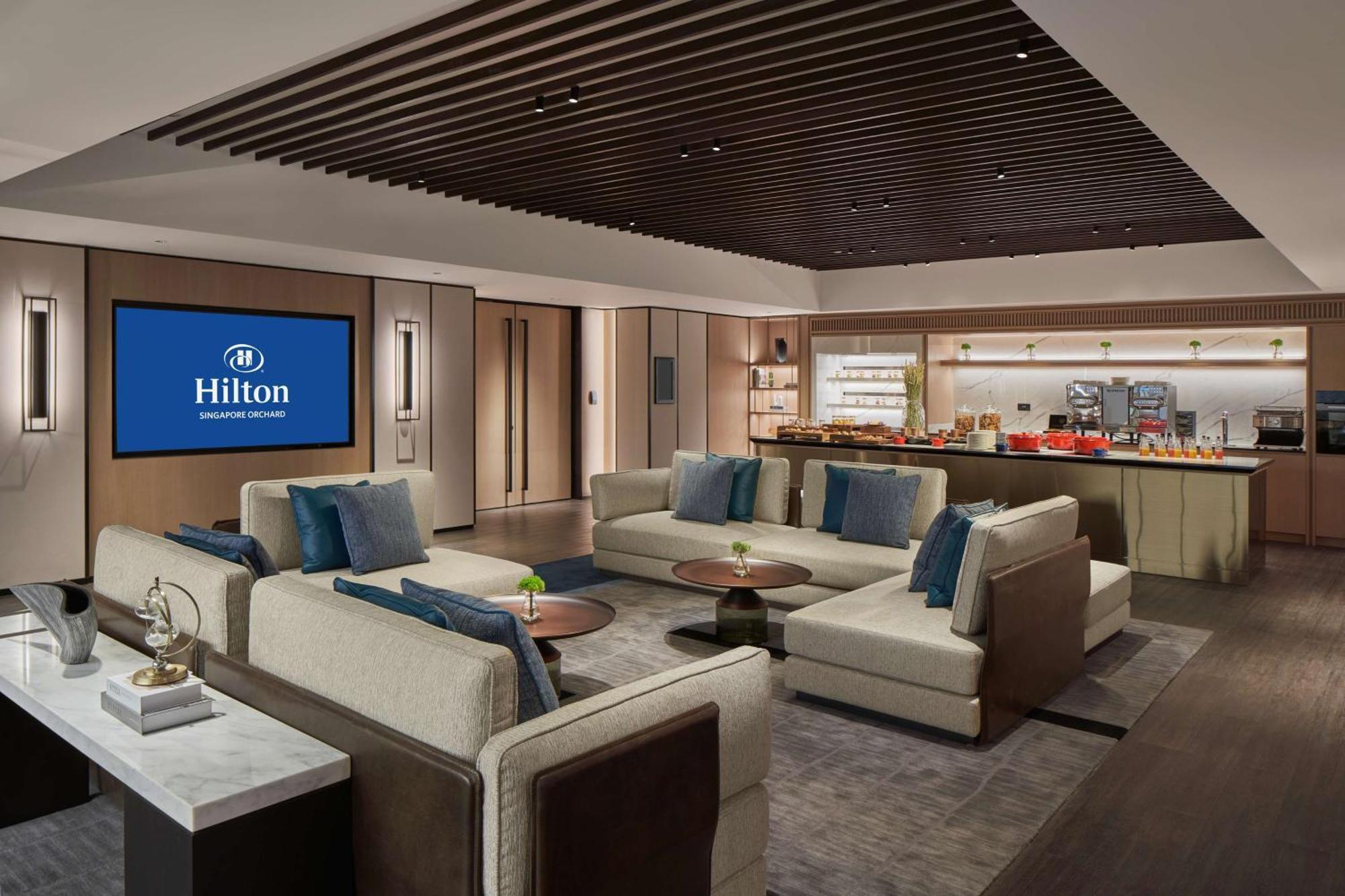 Hilton Singapore Orchard Kültér fotó Hilton Executive Lounge at Beijing Capital International Airport